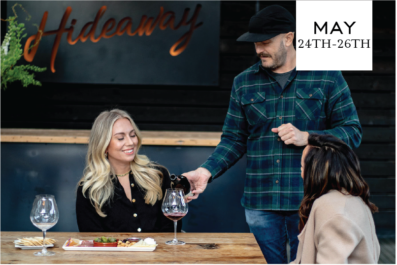 man pouring a woman a glass of wine for Memorial Day May 24th-26th