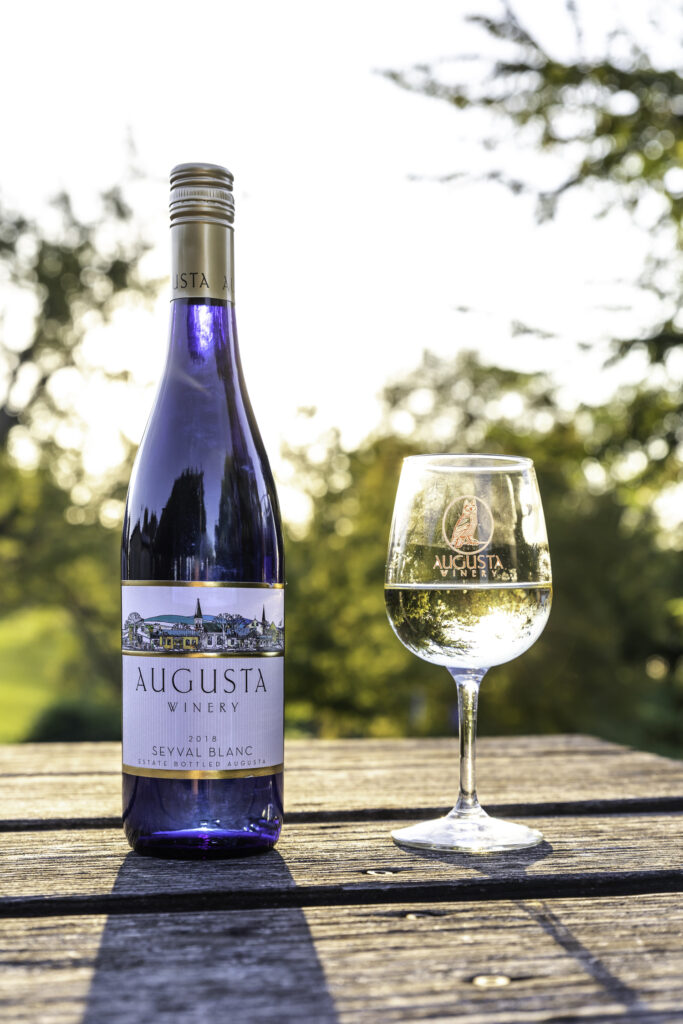 bottle and glass of Seyval Blanc wine
